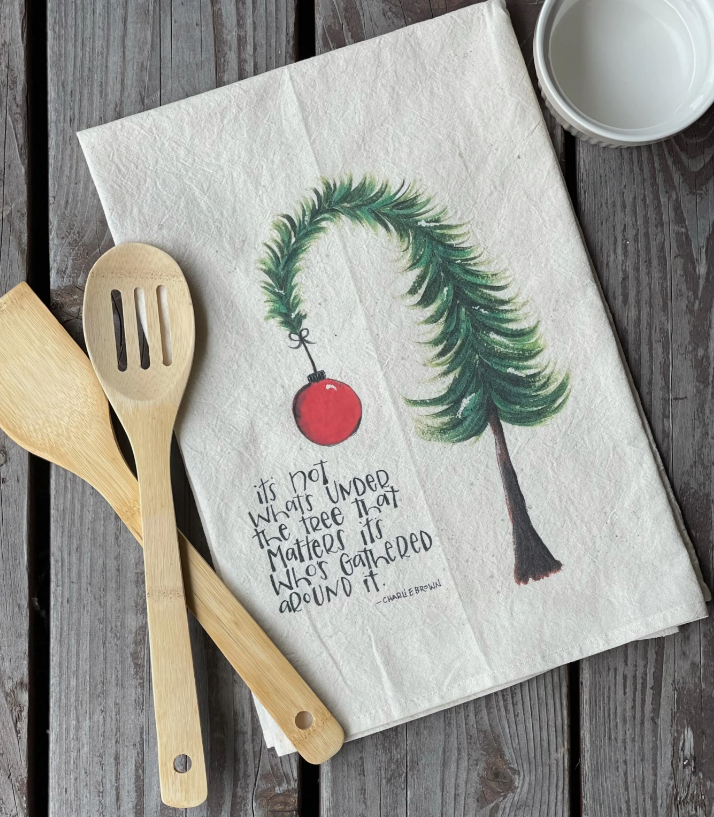 It's not what's under the tree that matters tea towel